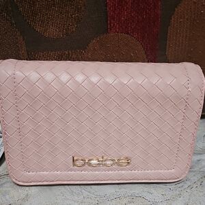 Bebe Light Pink Woven Clutch